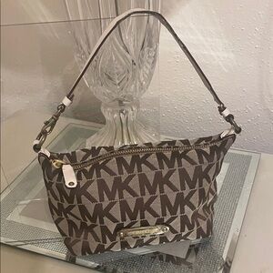 Michael Kors Brown and Cream Monogram pouchette bag
